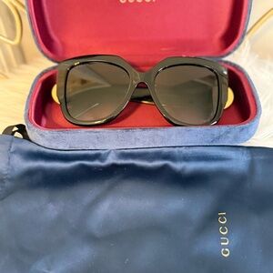 Authentic oversized Gucci Sunglasses with case and protective sleeve.